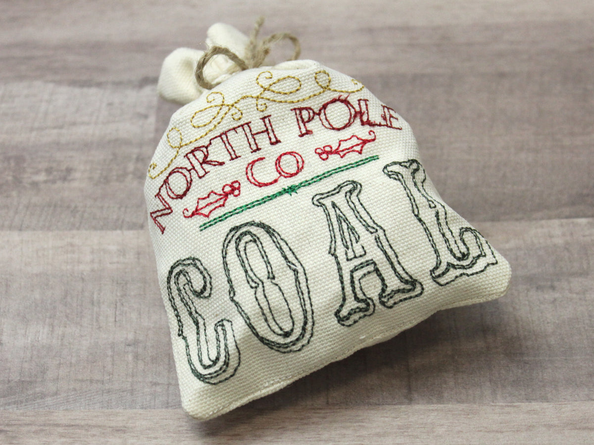 North Pole Co. Coal embroidered linen gift bag