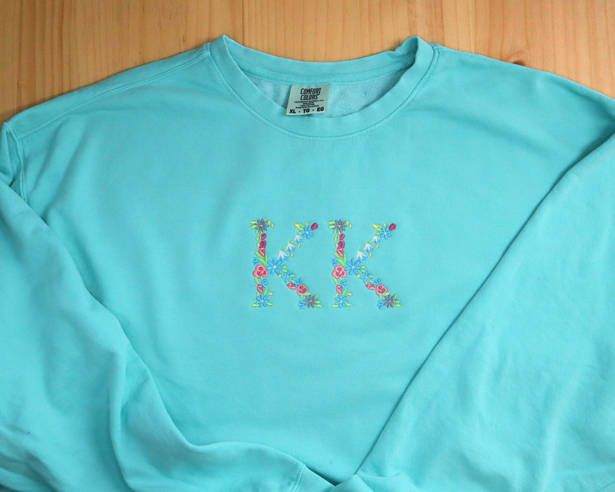 Customized Sweatshirt with Floral Lettering