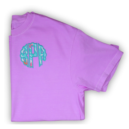 Folded purple t-shirt with a colorful monogram on a white background