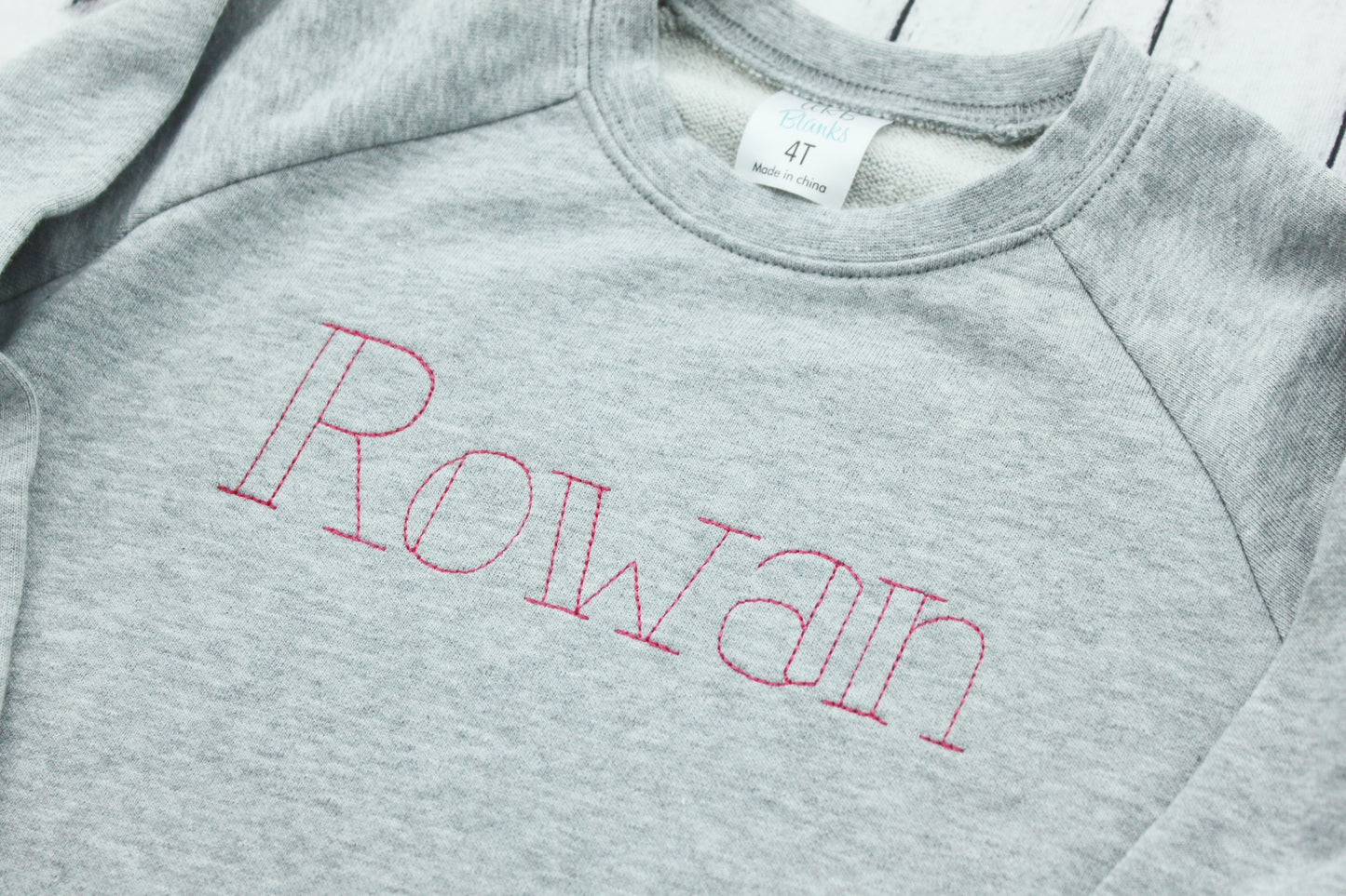 Youth Sweatshirt with hand-embroidered-style cursive message